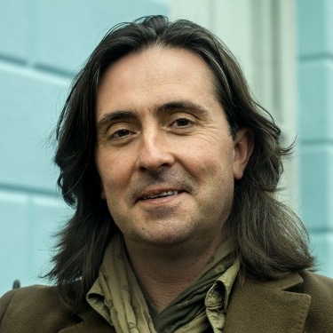 Neil Oliver Scottish Coast television presenter archaeologist conservationist author speaker at Great British Speakers